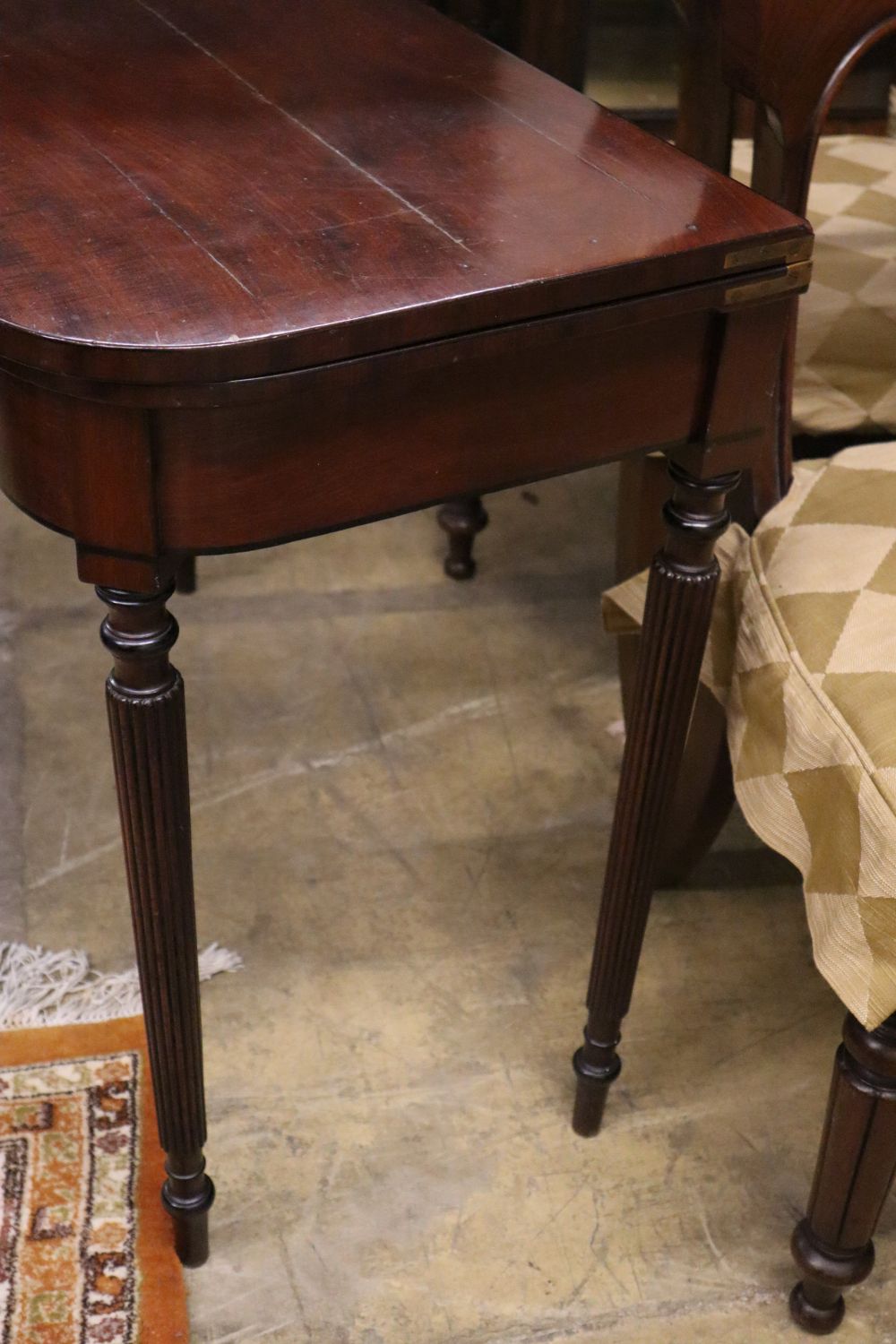 A Regency mahogany folding card table, width 91cm, depth 45cm, height 75cm